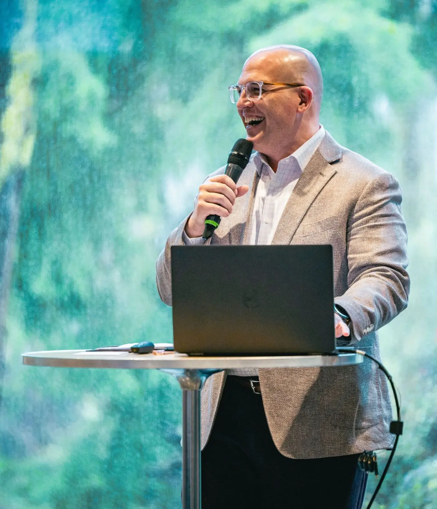 Speaker presenting at the West Coast Symposium